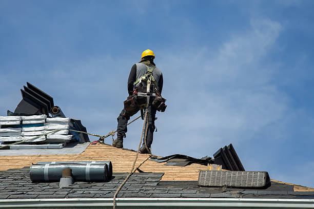 Professional Storm Damage Roof Repair technician working in Remington, IN